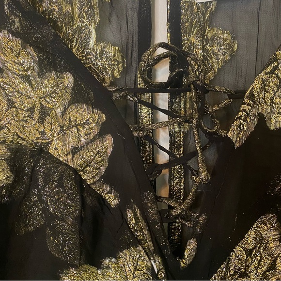 ASOS DESIGN Curve Metallic Frill Mini Dress With Lace Up  Neck In Black Pattern - Picture 7 of 14